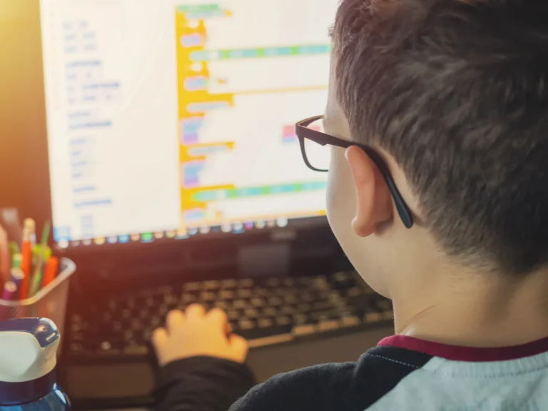 Boy glasses Scratch coding at Love to Code Academy
