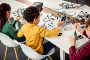 Students building robots overhead at Love to Code Academy