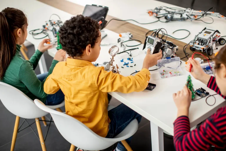 Students building robots overhead at Love to Code Academy