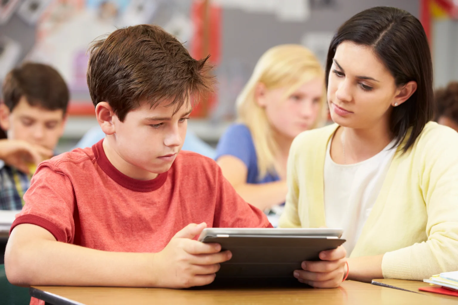 Instructor student tablet class at Love to Code Academy