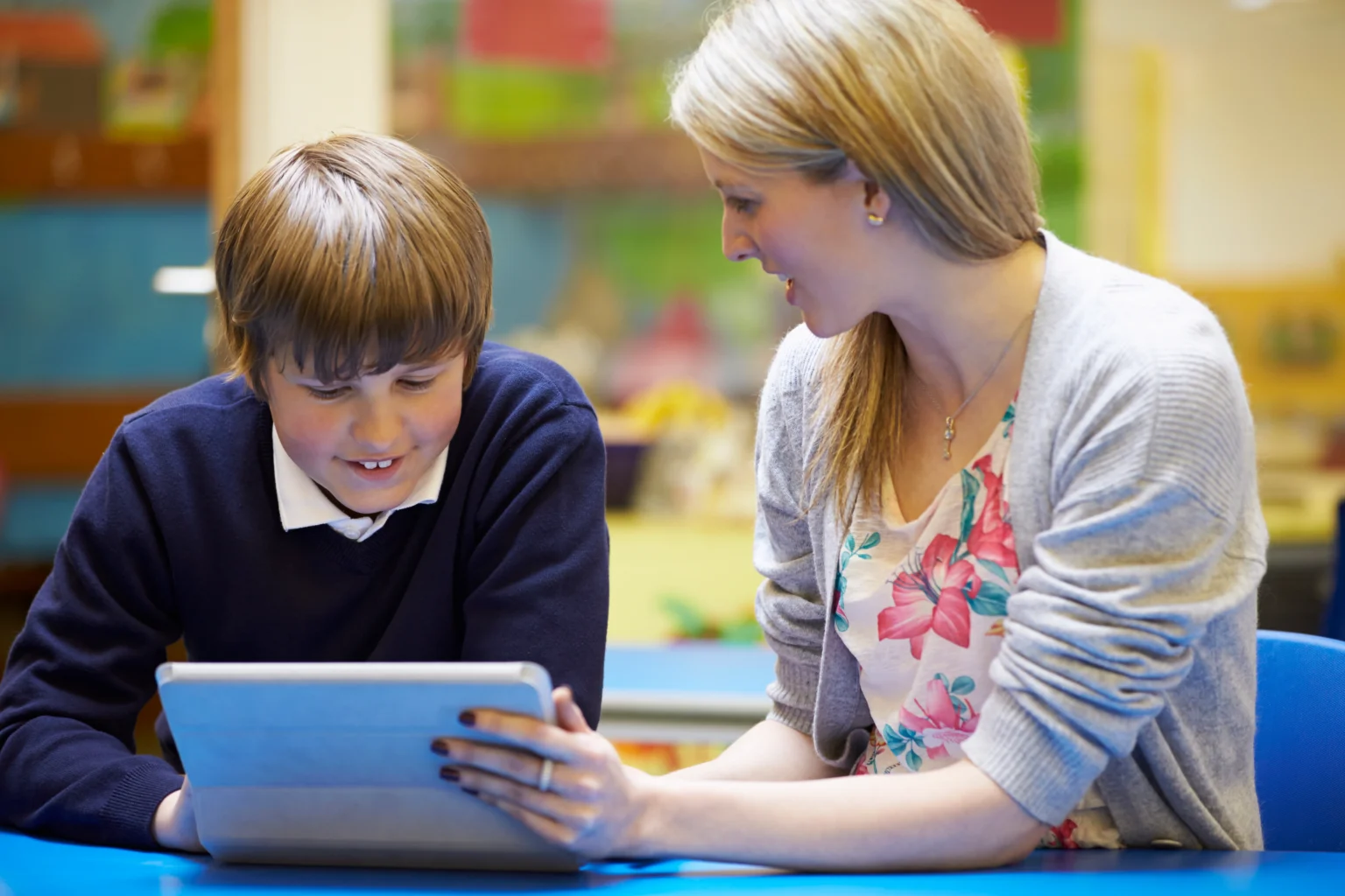 Instructor student tablet lesson at Love to Code Academy